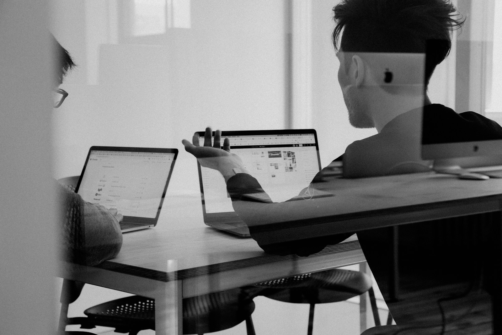 Young professionals working with technology
